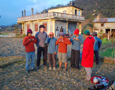 Mountain porters receiving donations from Tim Jasper, Brand Director at Rohan