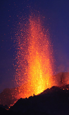 Just days after the initial eruption at Fimmvorduhals, a prominent volcanic cone of ash and lava had formed. Fountains of molten rock are  hurled several hundred feet into the sky. 